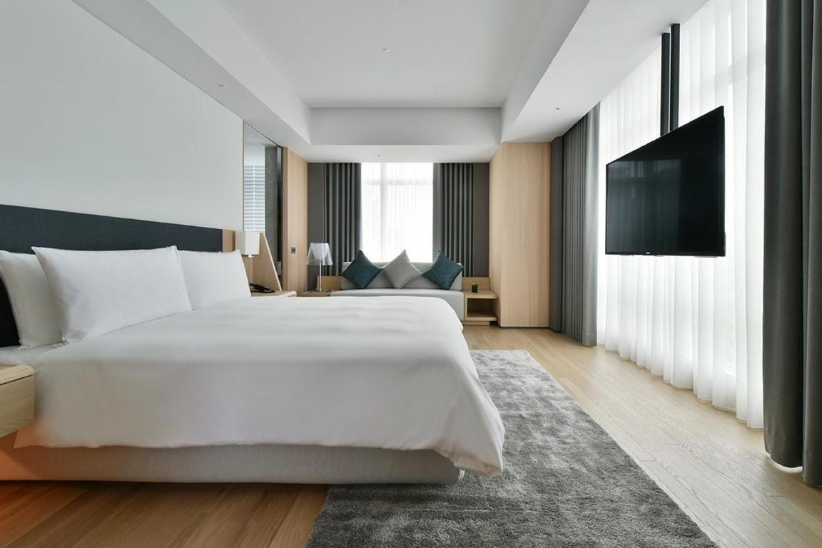 Hotel Silks Club Kaohsiung Esterno foto Deluxe Room